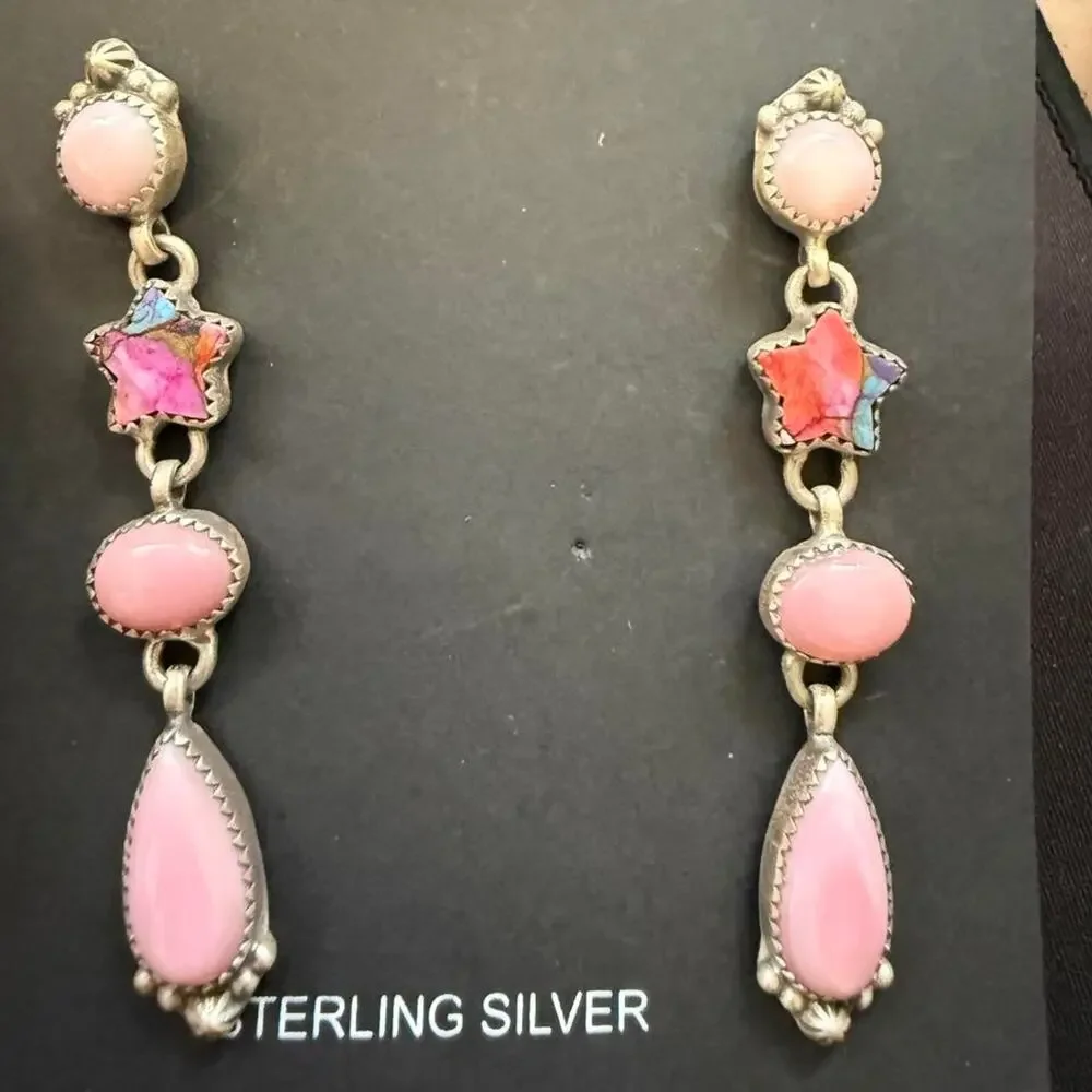 Beautiful handmade long sterling silver pink conch earrings